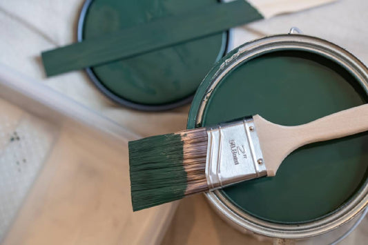 Green paint and paintbrush near Montclair, New Jersey (NJ)